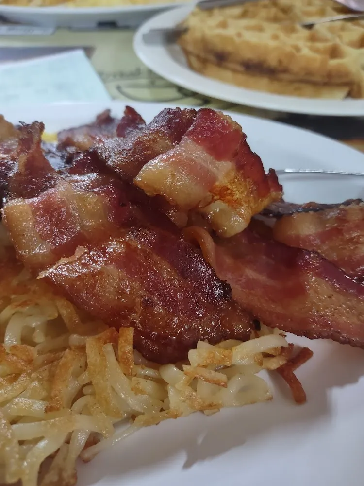 Bacon w 2 Eggs Scrambled and Hash Browns with Toast